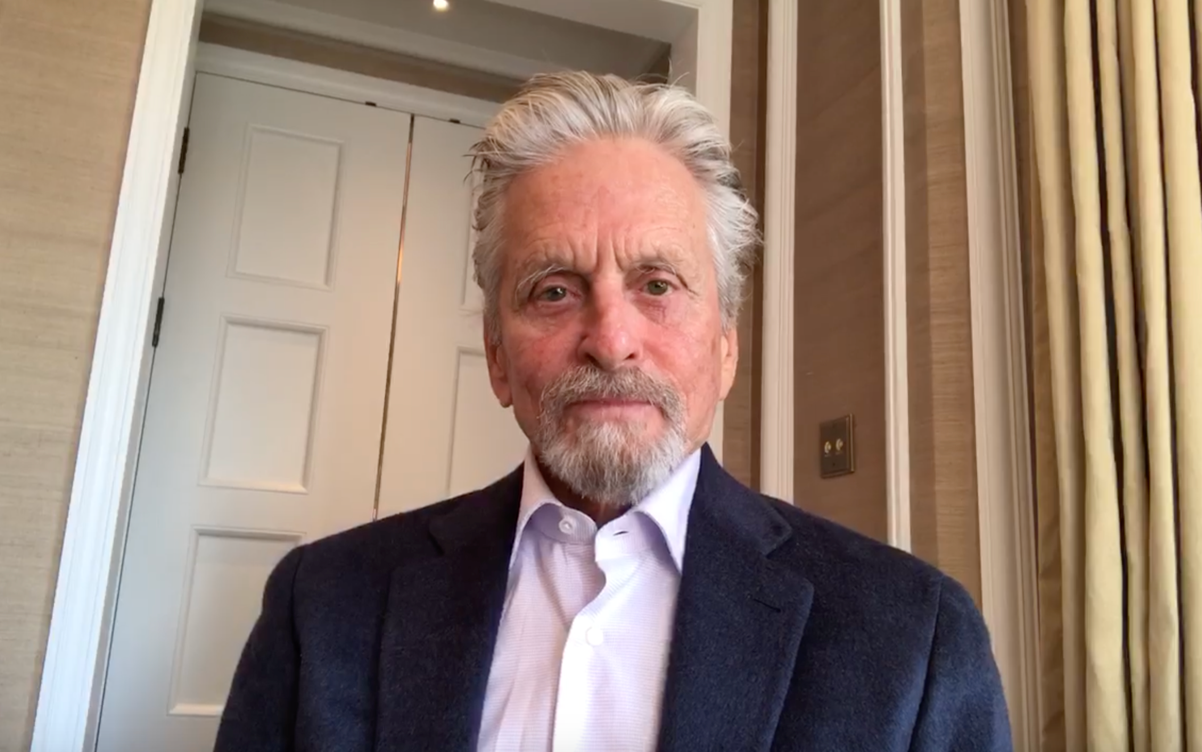 A person in a suit

Description automatically generated with medium confidence