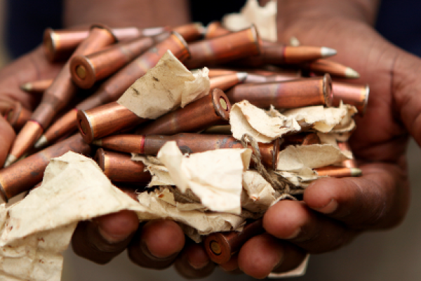 bullets in hand
