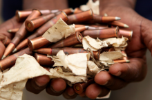 bullets in hand